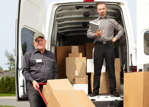 Professional movers handling office relocation in Manandvan