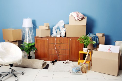 Office removal crew handling furniture in Pinner
