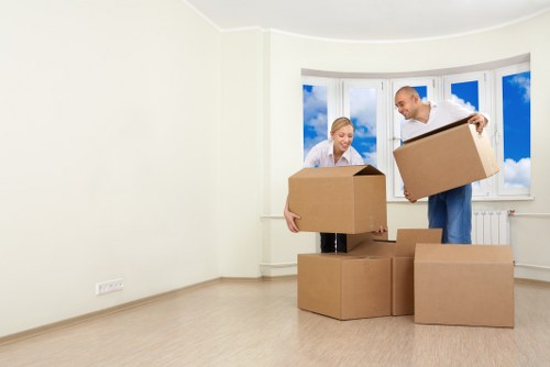 Professional furniture movers handling office furniture in Manandvan