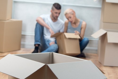 Professional movers handling household items for Manandvan Office Removals